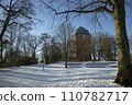 Hamburg in winter, Park around an ancient water tower in Sunny frosty day. High quality photo 110782717