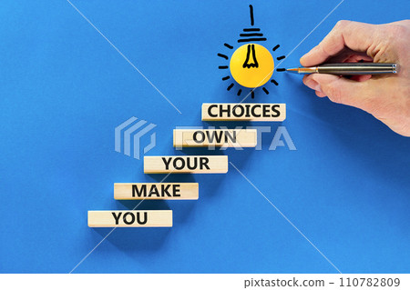 You make your own choice symbol. Concept words You make your own choice on wooden blocks. Beautiful blue table blue background. Businessman hand. Business you make your own choice concept. Copy space. You make your own choice symbol. Concept words You make your own choice on wooden blocks. Beautiful blue table blue background. Businessman hand. Business you make your own choice concept. Copy space. 110782809