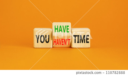 You have or not time symbol. Concept word You have or have not time on beautiful wooden cubes. Beautiful orange table orange background. Business and you have or not time concept. Copy space. 110782888