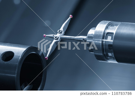 The modular touch probe checking the tube parts on CNC lathe machine. 110783786