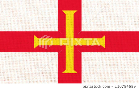 Flag of Guernsey. Guernsey state symbol. flag on fabric surface Flag of Guernsey. Guernsey state symbol. flag on fabric surface 110784689
