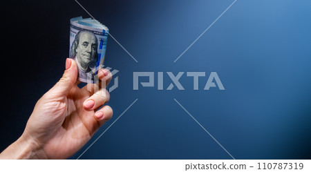 Hand holding banknotes Hand holding banknotes 110787319