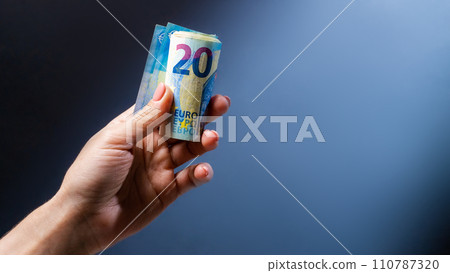Hand holding banknotes Hand holding banknotes 110787320
