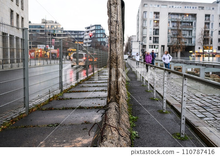 Broken Berlin wall between East and west Berlin 110787416