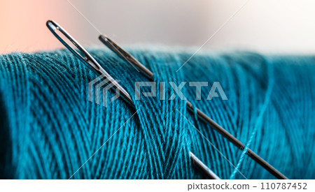 Needle with blue threat Needle with blue threat 110787452