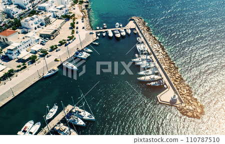 Airview of small yachts moored at jetty in Naoussa port, Greece Airview of small yachts moored at jetty in Naoussa port, Greece 110787510