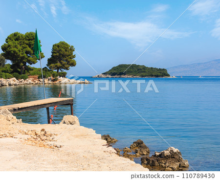 Summer morning view from Paradise Beach (Albania). 110789430