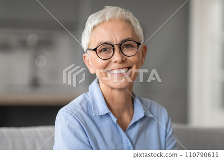 Portrait of happy caucasian mature woman posing at home 110790611