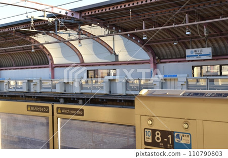 Sunny weather at Umegaoka Station platform, Tokyo 110790803