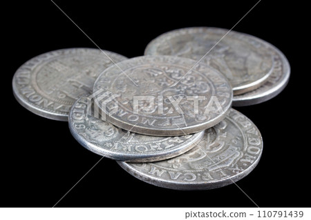 Stack of old vintage silver medieval taller coins 110791439