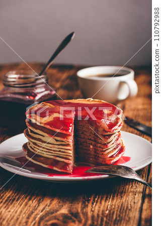 Stack of pancakes with berry jam Stack of pancakes with berry jam 110792988