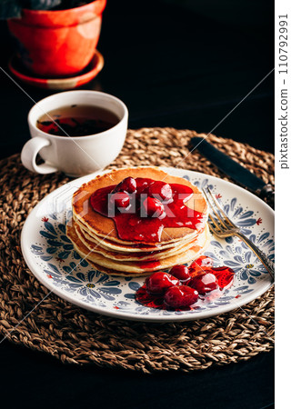 Stack of pancakes with dogberry jam 110792991