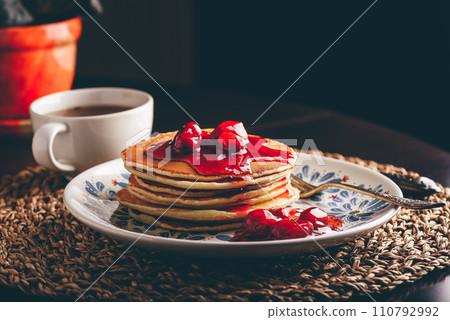 Stack of pancakes with dogwood berry marmalade 110792992