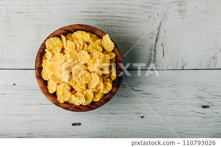 Rustic bowl of cornflakes Rustic bowl of cornflakes 110793026