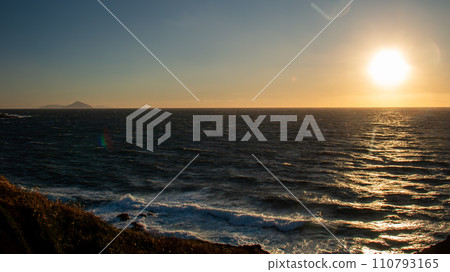 Winter in Izu Oshima, spectacular view of the sunset and sea, distant view of Toshima and Niijima Winter in Izu Oshima, spectacular view of the sunset and sea, distant view of Toshima and Niijima 110793165