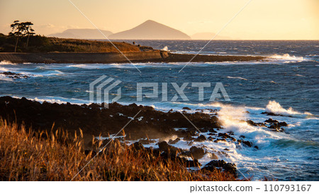 Winter in Izu Oshima, spectacular view of the sunset and sea, distant view of Toshima and Niijima Winter in Izu Oshima, spectacular view of the sunset and sea, distant view of Toshima and Niijima 110793167