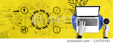 Rising arrow theme with person using a laptop 110793565