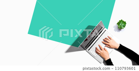 Person using a laptop computer 110793601