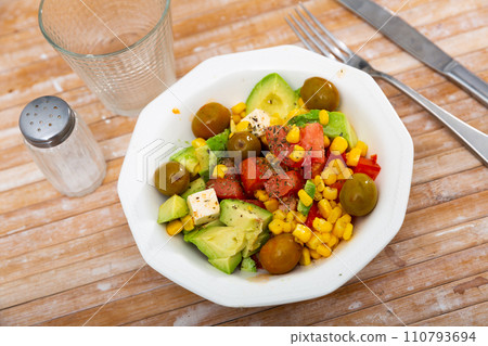 Plate with ready-made salad and its ingredients for recipe 110793694