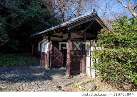 A scene of an old gate shrouded in silence 110793944
