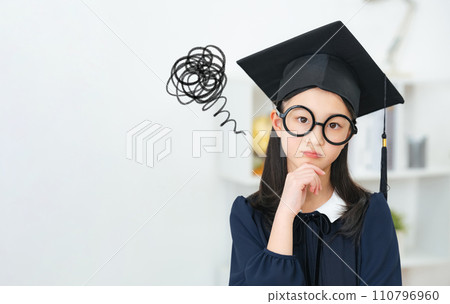 A girl wearing a troubled doctor costume A girl wearing a troubled doctor costume 110796960
