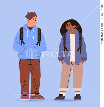 mix race couple of junior students with backpacks in casual clothes standing together education day concept full length 110797488