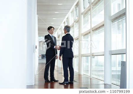 Businessman shaking hands Businessman shaking hands 110799199