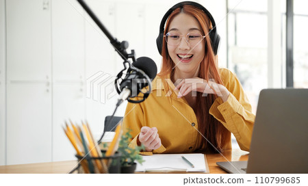 Live Podcast Session with Smiling Female Host. 110799685