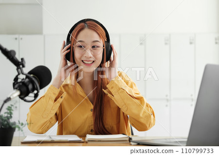 Live Podcast Session with Smiling Female Host. 110799733