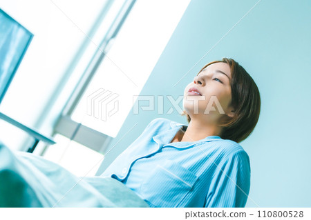 beautiful woman in pajamas 110800528