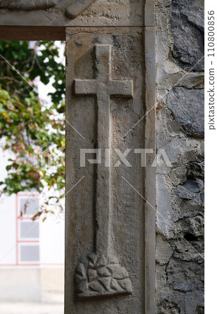 The entrance portal with the symbols of the Passion of Christ, the chapel of St. Wolfgang in Vukovoj, Croatia 110800856