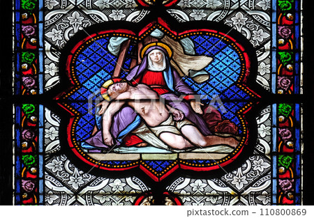 Deposition from the Cross, stained glass window in the Basilica of Saint Clotilde in Paris, France 110800869