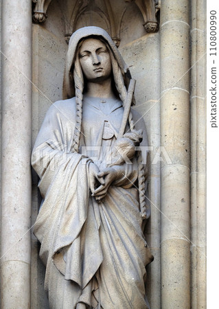 Saint Genevieve, statue on the portal of the Basilica of Saint Clotilde in Paris, France Saint Genevieve, statue on the portal of the Basilica of Saint Clotilde in Paris, France 110800990
