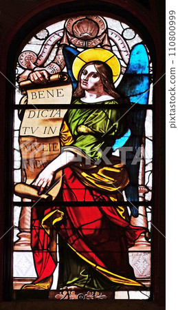Archangel Gabriel, Annunciation of the Virgin Mary, stained glass window in Saint-Eustache church in Paris, France 110800999