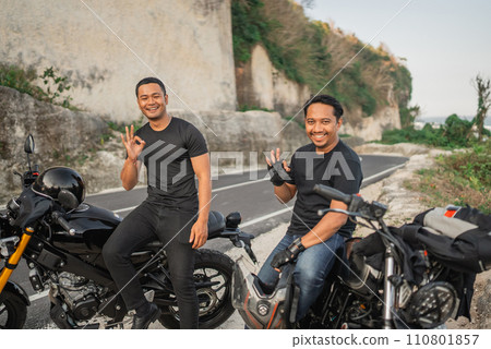 asian men sitting motorcycle okay gesture asian men sitting motorcycle okay gesture 110801857