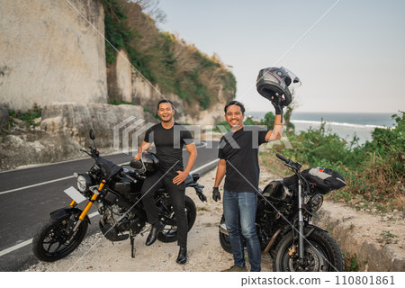leisure activity indonesian men riding motorbike 110801861