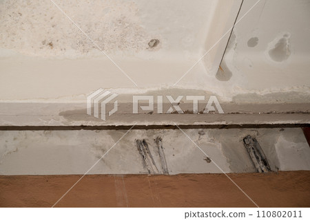 Flooding rainwater, causing damage, peeling paint and mildew. Flooding rainwater, causing damage, peeling paint and mildew. 110802011