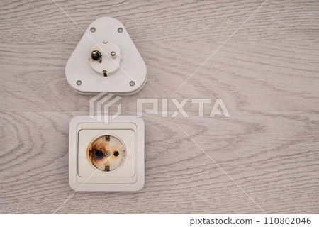 Plug and socket burned melted electrical short circuit or burnout due to poor contact 110802046