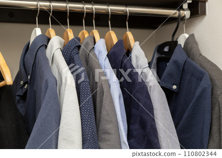 Closet with men's clothes Closet with men's clothes 110802344