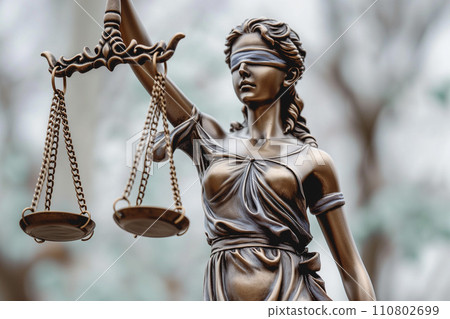 Themis, the goddess of justice with a sword and - Stock