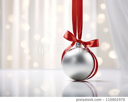 AI-generated content. White round isolated Christmas ball with red satin bow.  110802978