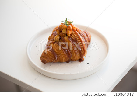 Croissant with caramel spread 110804318