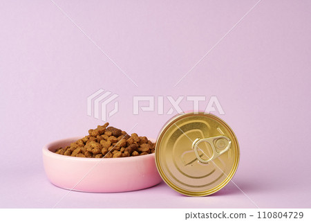 Cat food on pink background in studio 110804729