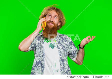 Happy surprised man involved in pleasant conversation phone call good news enjoying talking gossip Happy surprised man involved in pleasant conversation phone call good news enjoying talking gossip 110804986