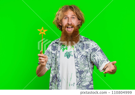 Magician witch young man gesturing with magic wand making wish come true, casting magician spell Magician witch young man gesturing with magic wand making wish come true, casting magician spell 110804999