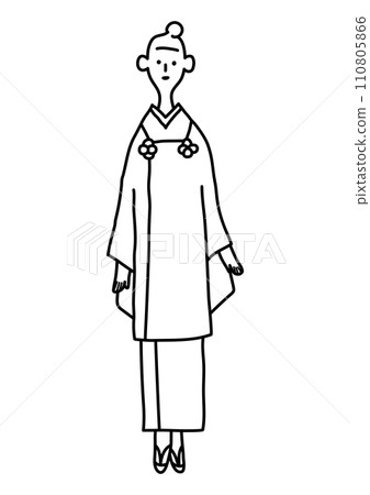 Women's fashion - A woman with bun hair on the street 110805866