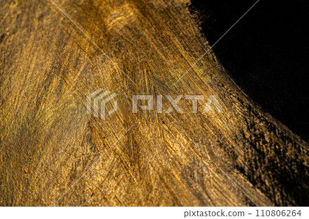 golden and black background 110806264