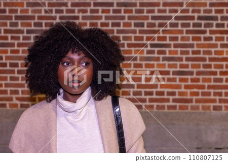 Urban Serenity: Brick Wall Contemplation Urban Serenity: Brick Wall Contemplation 110807125