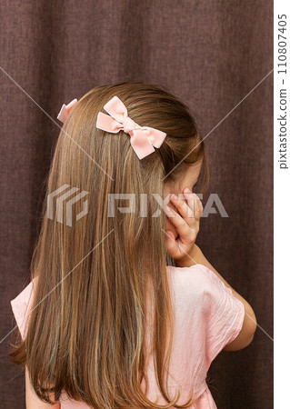 Gray beautiful hair bows for girls. Fashion accessory for girls' hair isolated on white background. Stylish hair accessory for kids. Gray beautiful hair bows for girls. Fashion accessory for girls' hair isolated on white background. Stylish hair accessory for kids. 110807405