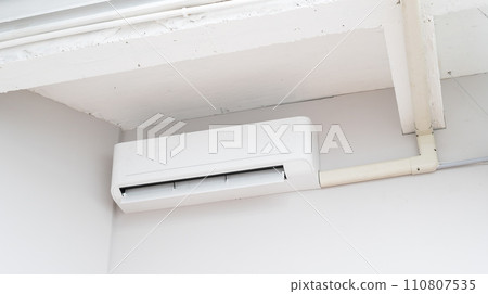 air conditioning system. pure indoor climate. With advanced technology and energy efficient operation, white room wall mounted unit ensures optimal temperature and ventilation. 110807535